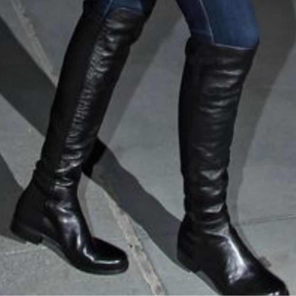 Knee high black boots with small heel